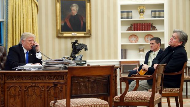 President Donald Trump with Mike Flynn and Steve Bannon in the Oval Office.