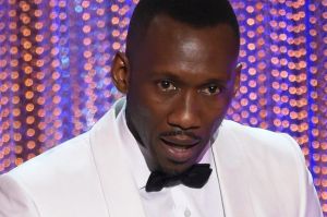 Mahershala Ali accepts the award for outstanding performance by a male actor in a supporting role for <i>Moonlight</i> ...