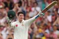 Magic moment: Renshaw salutes the crowd after making 100 in Sydney.