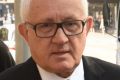 Ron Medich arrives at King Street Supreme Court on Monday to face trial.