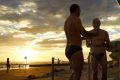 Swimmers rinse off after a swim at Clovelly Beach earlier this month.