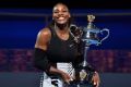 Serena Williams with the cup after beating sister Venus Williams.