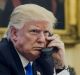 US President Donald Trump speaks on the phone with Malcolm Turnbull on Sunday morning. 