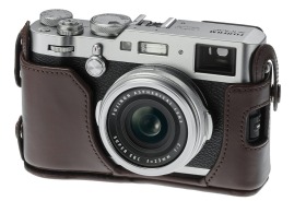 Fujifilm X100F digital camera in a leather case.