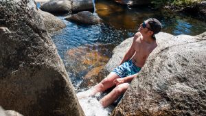 Luke Clarke of Calwell cools off in the rock pools at Gibraltar Falls