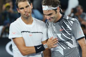 Great players, great men: Rafael Nadal congratulates Roger Federer on his Australian Open triumph. 