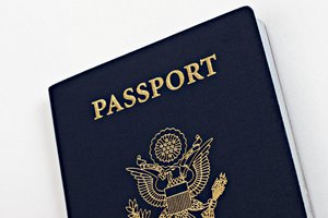 A United States Passport book cover photographed against a white background