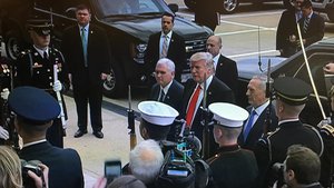 File - President and Commander in Chief Donald J.Trump and Vice President Mike Pence join Defense Secretary Jim Mattis for an honor cordon at the Pentagon.