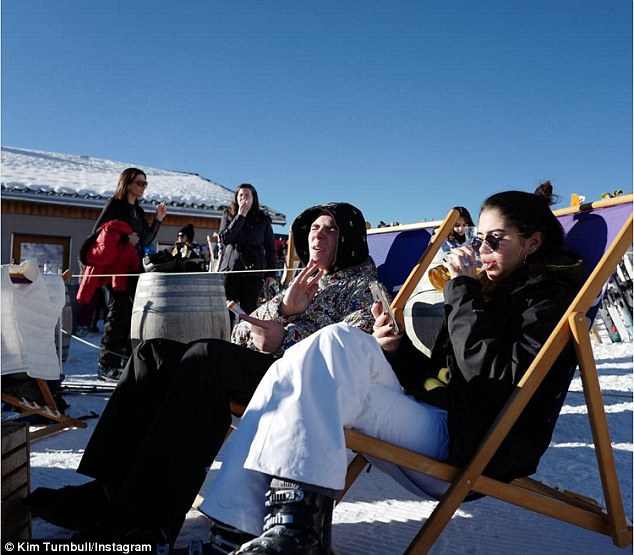 Frosty reception: The couple enjoyed a beer during their Verbier holiday