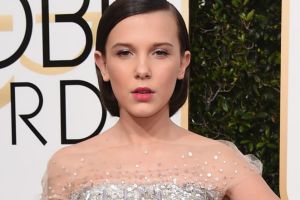 Millie Bobby Brown arrives at the 74th annual Golden Globe Awards at the Beverly Hilton Hotel on Sunday, Jan. 8, 2017, ...