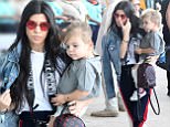 , Liberia,  - - 01/30/2017 - Kim Kardashian holds both her children North and Saint on either hip while sister Kylie carries Tyga's son King, as the whole clan arrives to the airport for their flight out of Costa Rica.\n-PICTURED: Kourtney Kardashian, Reign Disick\n-PHOTO by: INSTARimages.com\n-Instar_Kardashian_West_in_Costa_Rica_10011166529\nEditorial Rights Managed Image - Please contact www.INSTARimages.com for licensing fee and rights: North America Inquiries: email sales@instarimages.com or call 212.414.0207 - UK Inquiries: email ben@instarimages.com or call + 7715 698 715 - Australia Inquiries: email sarah@instarimages.com.au ¿or call +02 9660 0500 ñ for any other Country, please email sales@instarimages.com. ¿Image or video may not be published in any way that is or might be deemed defamatory, libelous, pornographic, or obscene / Please consult our sales department for any clarification or question you may have - http://www.INSTARimages.com reserves the right to pursue unauthor