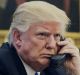 US President Donald Trump speaks on the phone with Malcolm Turnbull on Sunday morning. 