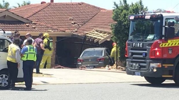 The unmarked police car crashed into the front of the Dianella house.