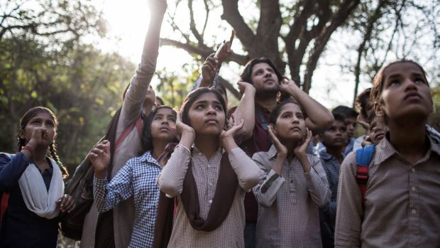 Students take a tour of the Mangar Bani forest and listen for birds.