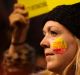 A demonstrator takes part in a protest against US President Donald Trump's controversial travel ban.