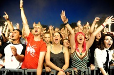 NOVI SAD, SERBIA - JULY 11:  Festival-goers cheer at Day 4 of the Exit Festival on July 11, 2010 in Novi Sad, Serbia.  ...