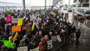 Demonstrators gather during a protest against President Donald Trump's executive order banning travel to the United ...