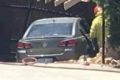 The unmarked police car crashed into the front of the Dianella house. 