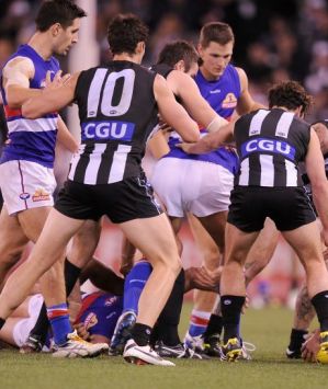 Congestion in the pack during a Collingwood-Bulldogs game last season. The AFL feels it is increasing this year.