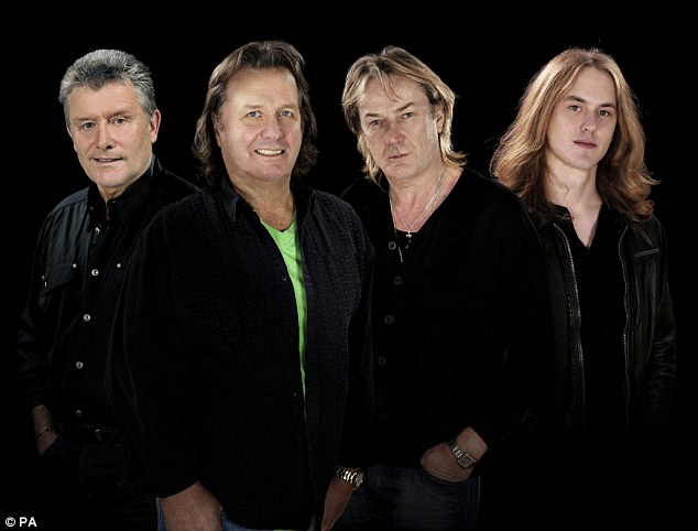 Wetton, second left, was lead singer and bassist for Asia, and also wrote many of their hits, including Heat of the Moment with Geoff Downes, second right