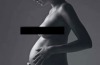 Miranda Kerr disrobed for the 'family' edition of <i>W</i> magazine. The stunning black and white photo was shot by ...
