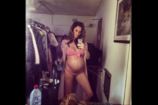 Model Nicole Trunfio has shown off her 7 month pregnant figure on Instagram in a post titled 'It's sun baking time!' ...