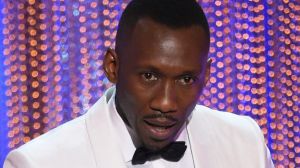 Mahershala Ali accepts the award for outstanding performance by a male actor in a supporting role for <i>Moonlight</i> ...