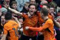 Joy for Wolves as Richard Stearman celebrates scoring his side's first goal against Liverpool.