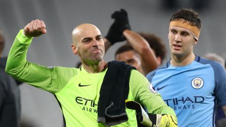 Man City's Willy Caballero and John Stones celebrate after beating West Ham.