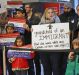 People protest at Indianapolis International Airport against President Donald Trump's executive order temporarily ...