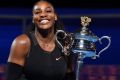 Serena Williams with the Australian Open trophy on Saturday night.