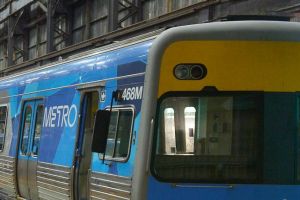 Downer EDI workers work on building new rail carriages. 