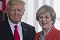 British PM Theresa May says Donald Trump's state visit to the UK will go ahead.