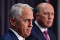 Prime Minister Malcolm Turnbull and Minister for Immigration Peter Dutton at a press conference in Canberra on Monday.