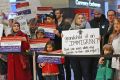 People protest at Indianapolis International Airport against President Donald Trump's executive order temporarily ...