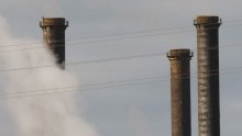 Steam and other emissions are seen coming from funnels of the brown coal Morwell Power Station