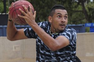 Hoops fan: Tennis star Nick Kyrgios practising his basketball skills.