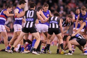 Congestion in the pack during a Collingwood-Bulldogs game last season. The AFL feels it is increasing this year.