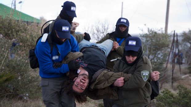 Hundreds of youths streamed into the outpost, ruled illegal by Israel's highest court, to fight the evacuation.