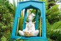 A garden shrine hints at the spiritual side to the She Universe Cafe operation.