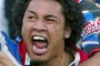 New Zealand Warriors legend Clinton Toopi, centre, celebrates with teammates Wairangi Koopu, left, and Francis Meli as ...