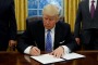 Trump signs an executive order on US withdrawal from the TPP.
