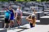 Tourists taking photos at the Holocaust Memorial in Berlin.