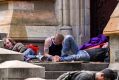 Some of the homeless people from Flinders Street are now camped at St Paul's Cathedral. 