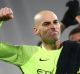 Man City's Willy Caballero and John Stones celebrate after beating West Ham.