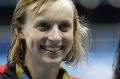 United States' Katie Ledecky smiles with her gold medal after the women's 400-meter freestyle during the swimming ...