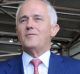 Prime Minister Malcolm Turnbull speaks to the media after a visit to the CSR Viridia Glass factory in Dandenong, south ...