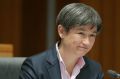 Senator Penny Wong puts questions to DFAT officials during an estimates hearing at Parliament House in Canberra on ...