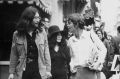 John Lennon  with wife Yoko Ono and Greek host, Alexis Mardas,  during a tour of Athens' shops. 