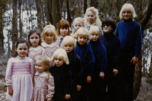 The children of The Family, many of whom had their hair dyed blonde to make them look like siblings.